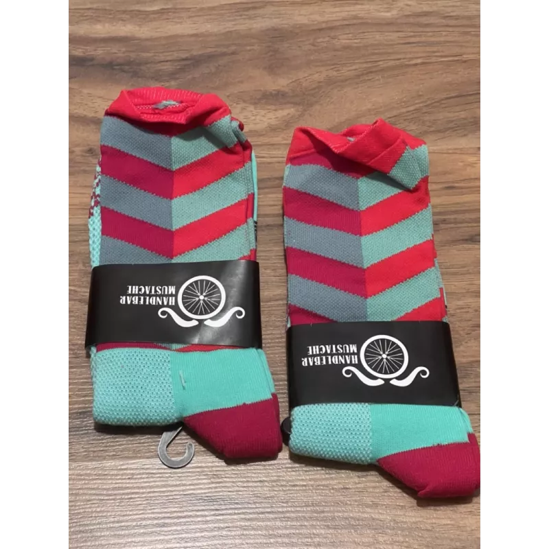 Chaussettes DeFeet Handlebar Mustache turquoise et rouge
