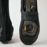 Underside view of Spatzwear TUFR2 overshoes, vulcanised sole with cleat opening.