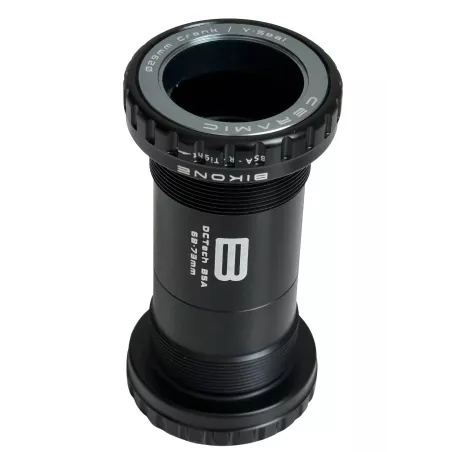 Boîtier Bikone BSA DUB céramique en position verticale — filetage BSA 68-73 mm, roulements céramiques haute performance.