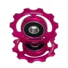 Close-up of limited edition pink CyclingCeramic derailleur pulleys, 11-tooth ceramic pulley wheels for Shimano 11-12s