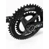 Close-up of QO Race black crankset with 50T chainring and carbon crank arm