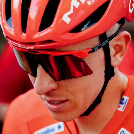 SCICON Aeroshade 2.0 Titanium Rouge Vuelta sunglasses worn by Pogacar with cycling helmet, mirrored lens